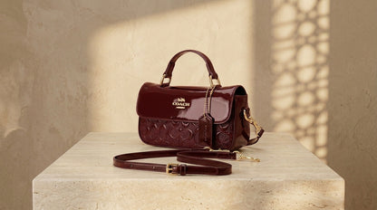 Style Coach bordeaux brillant  (mini)
